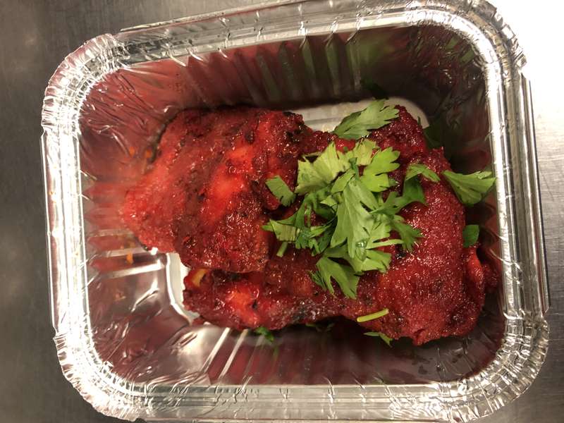 Takeaway — tandoori chicken in foil container